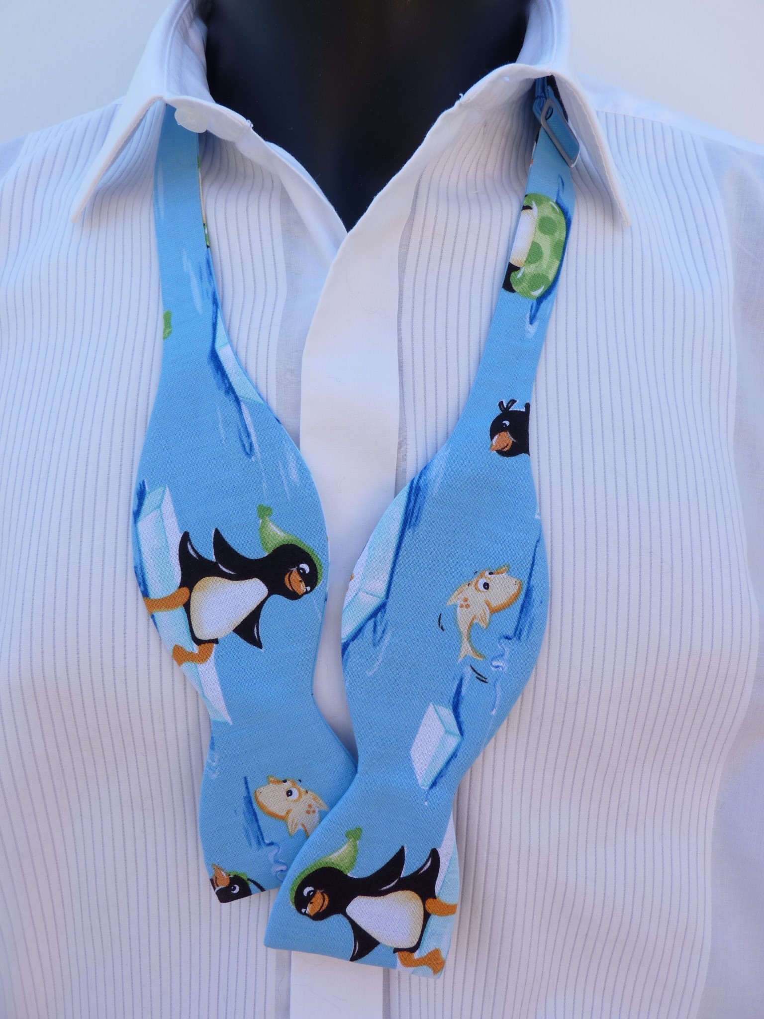 4_0_1556_2145Holiday_Penguins_st_2.jpg